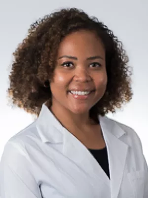 Portrait of Casey Tompkins-Rhoades, MD